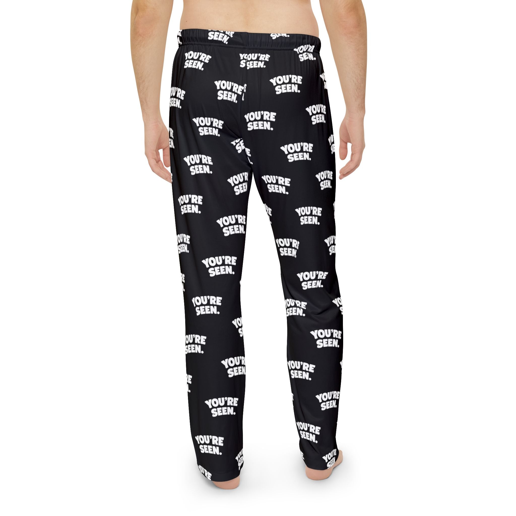 YOU'RE SEEN Repeat Text Pajama Pants | Black All-Over Print